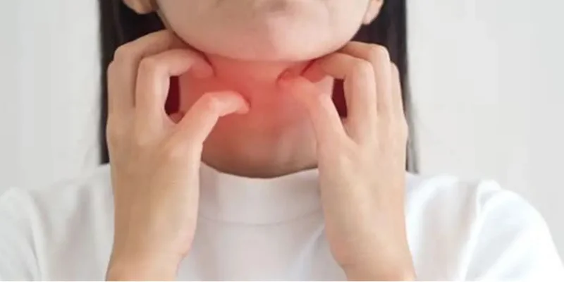 Wicker chair on blue rug