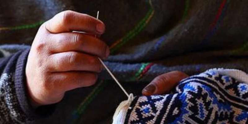 Wicker chair on blue rug
